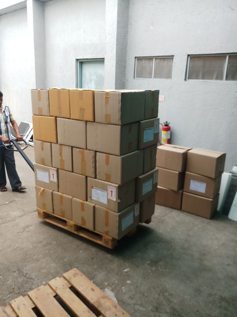 Professional moving team handling boxes
